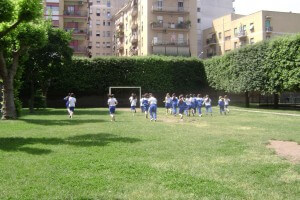 Istituto Sacro Cuore Roma Scuola Sacro Cuore - Bambini che corrono nel campo da calcio